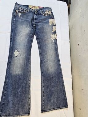 Women's Blue Distressed Flare Jeans with Embroidery